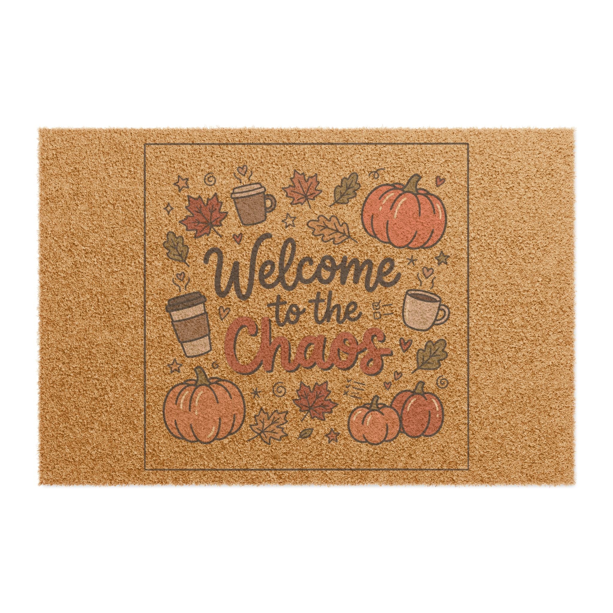 Front view of a coir doormat with "Welcome to the Chaos" text, surrounded by pumpkins, coffee mugs, and autumn leaves.