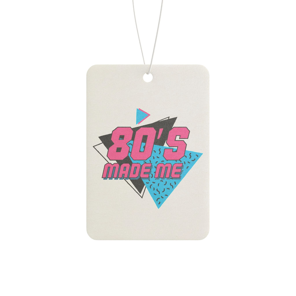 Rectangular car air freshener with "80's MADE ME" in pink, teal, and black retro graphic on front.