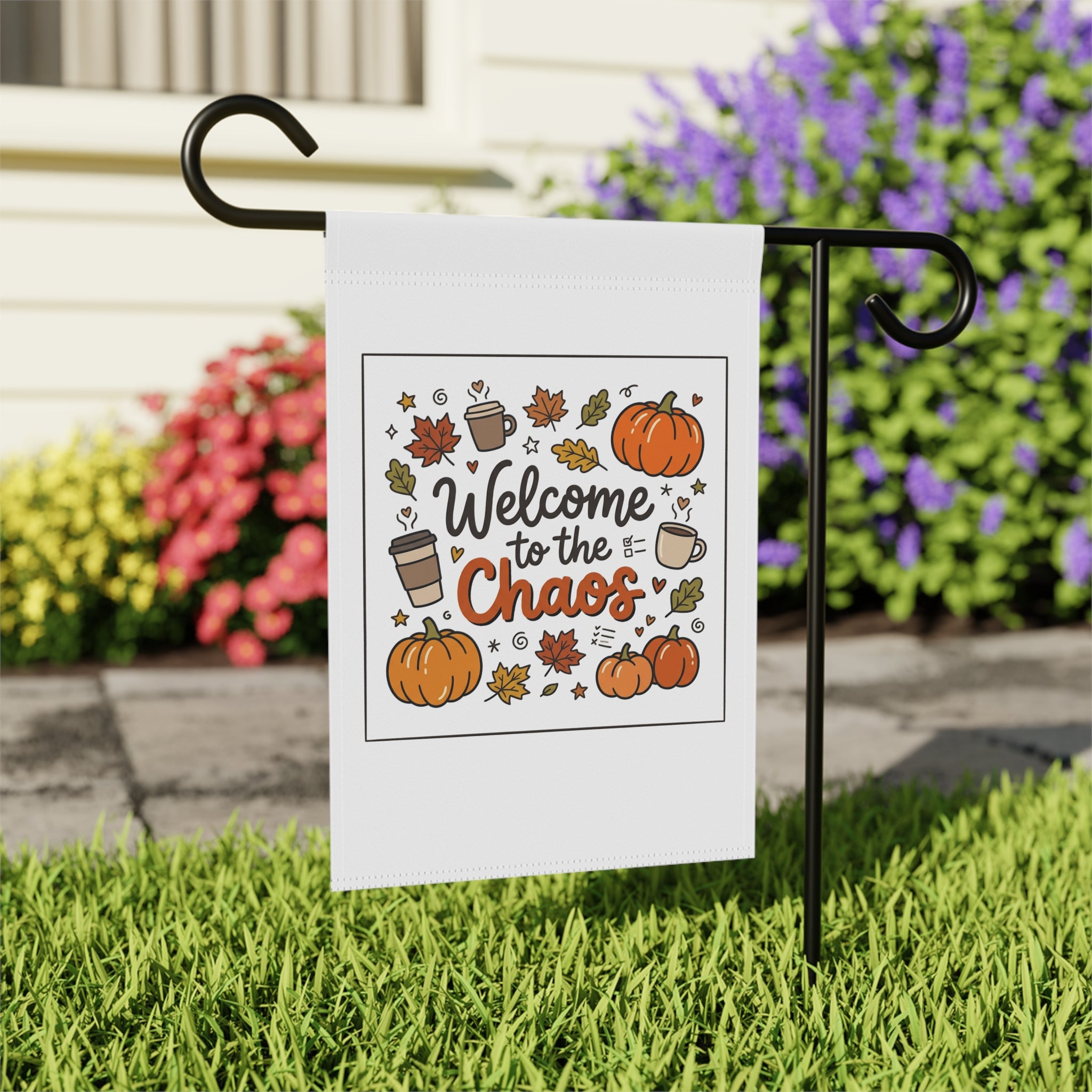 Welcome to the Chaos Fall Garden Flag with pumpkins, coffee cups, and autumn leaves on a white background.