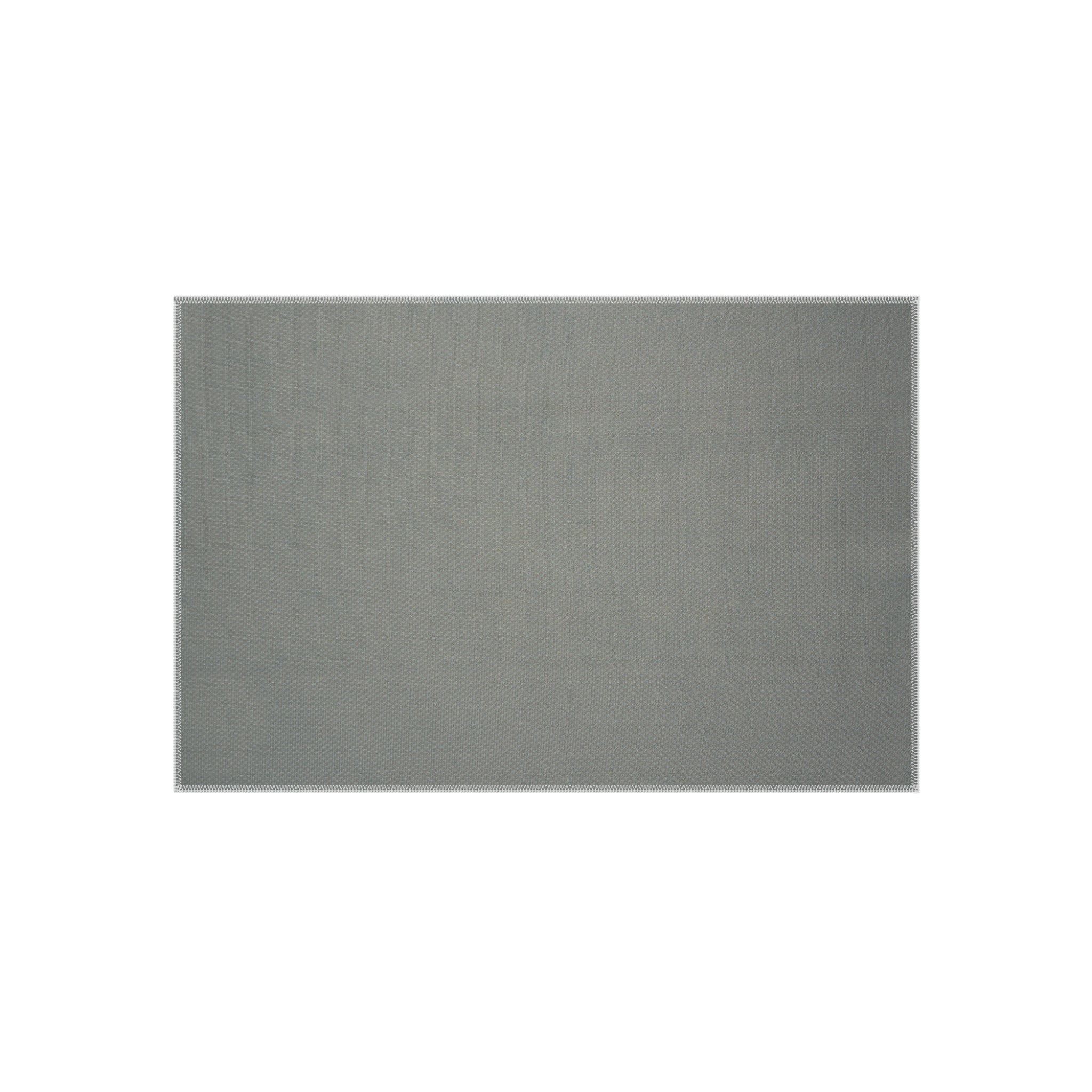 A rectangular outdoor rug with a gray, tightly woven texture, seen from a top-down angle.