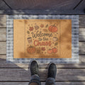 Fall-themed coir doormat with "Welcome to the Chaos" text, pumpkins, coffee cups, and autumn leaves.