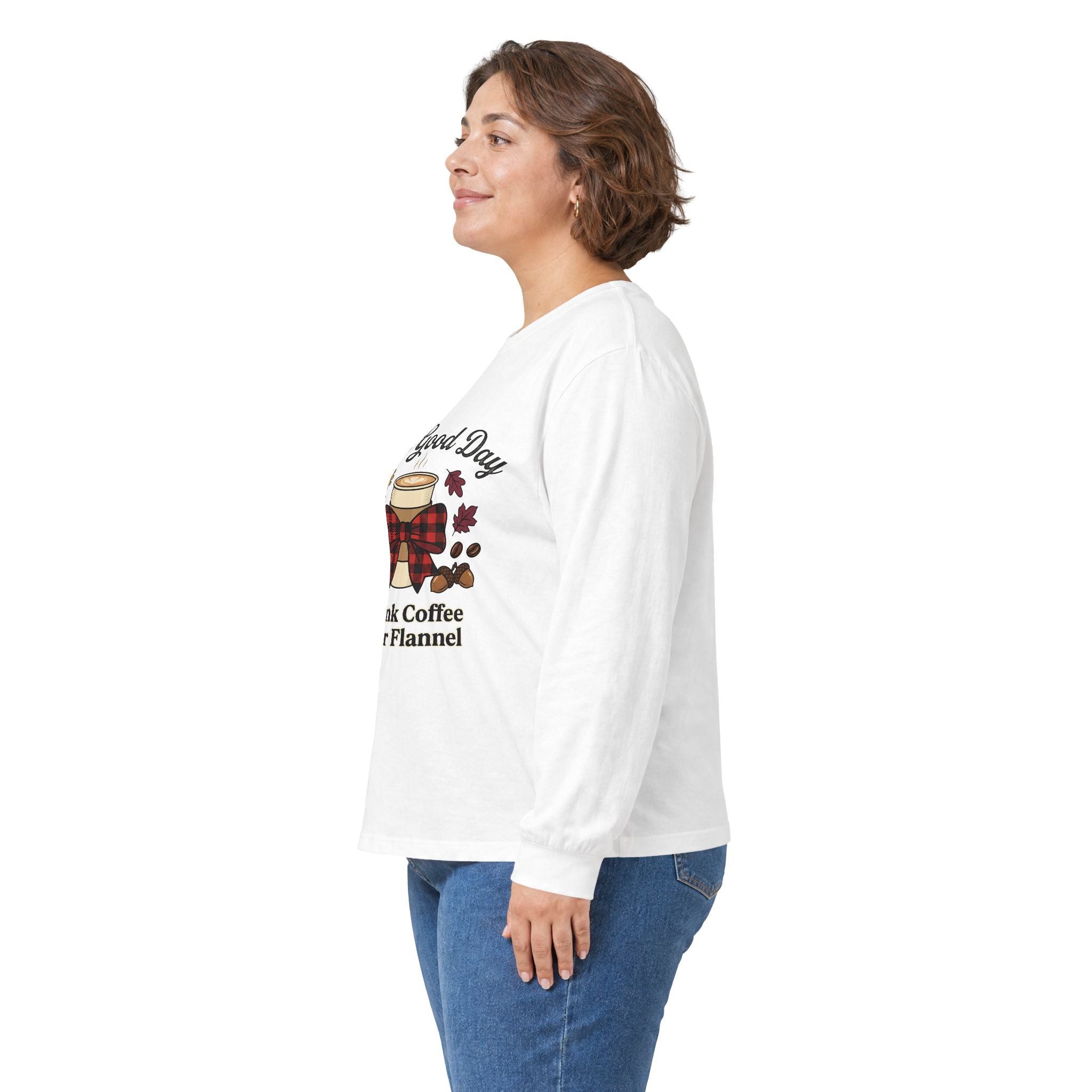 Side view of a woman wearing a white long sleeve tee with "Good Day to Drink Coffee & Wear Flannel" graphic.