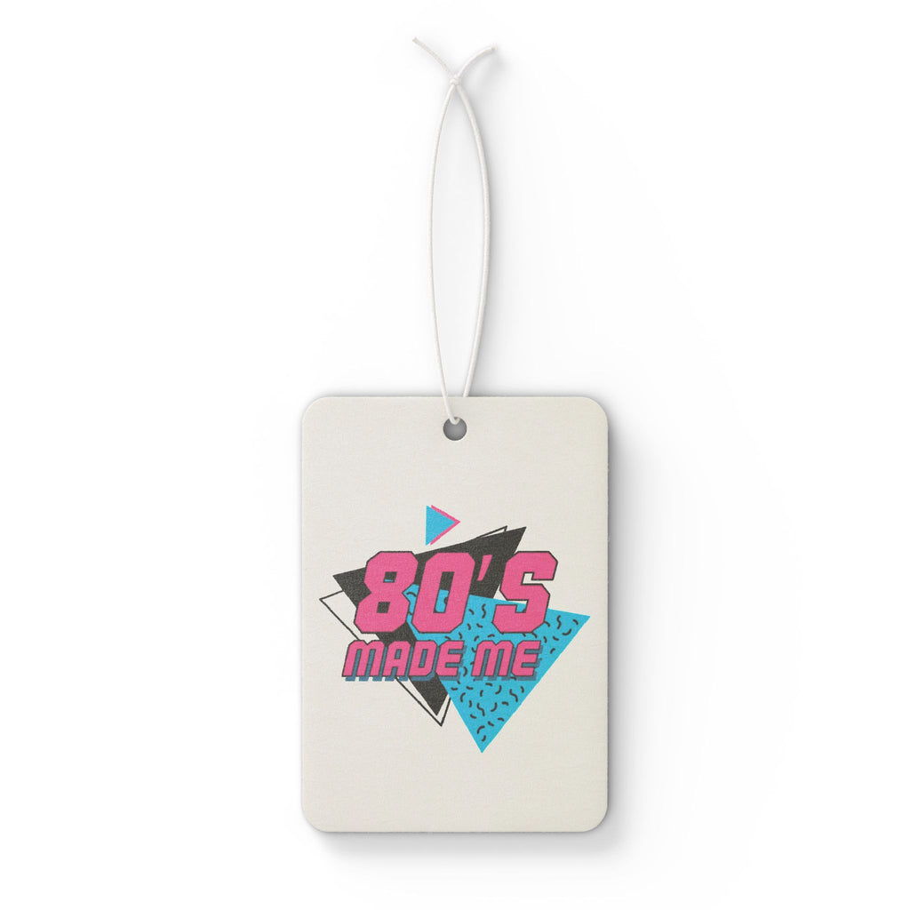 Front view of a rectangular 80's Made Me Car Air Freshener with a retro neon pink and teal graphic.