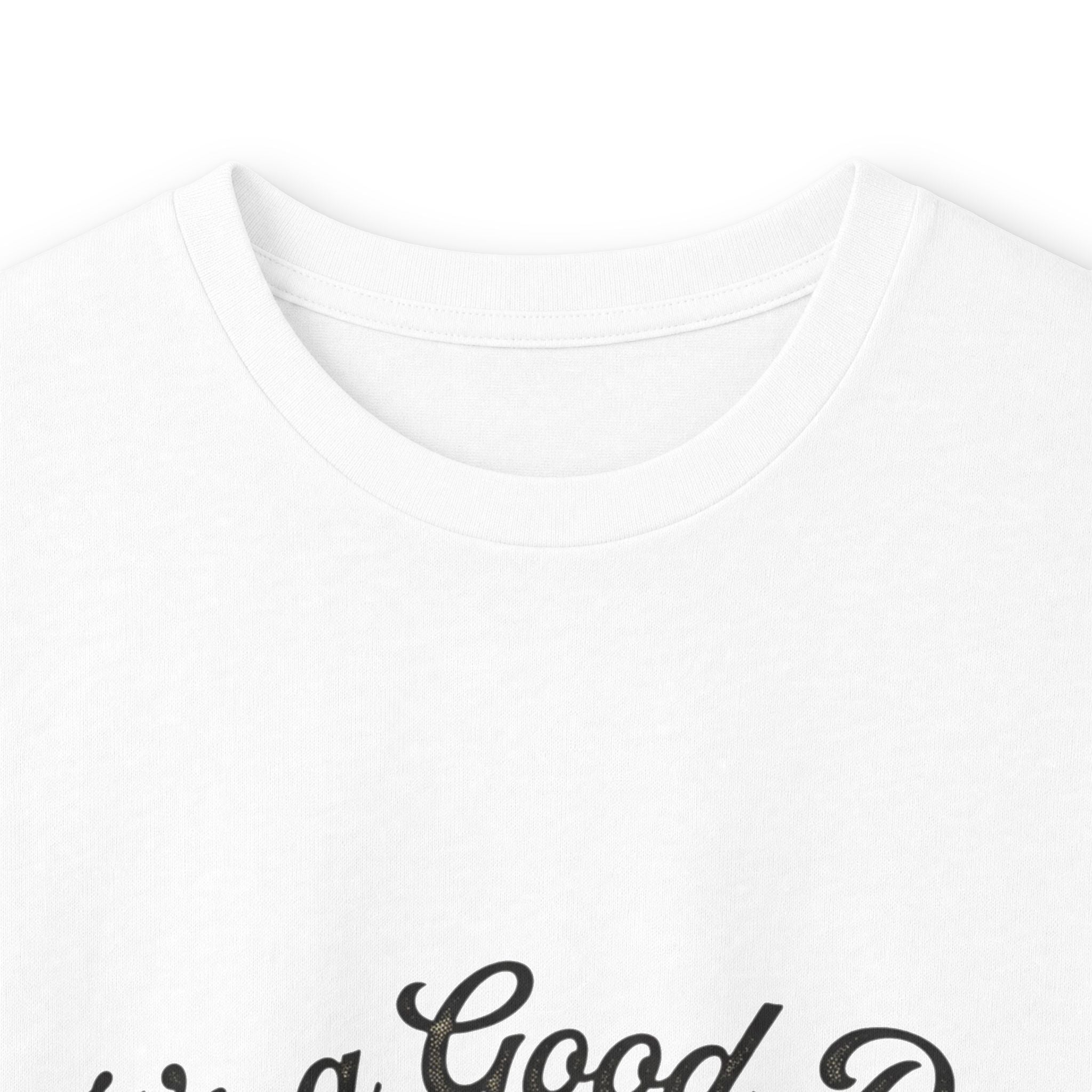 Close-up of a white long sleeve tee with a black script font that reads "Good Day to Drink Coffee"